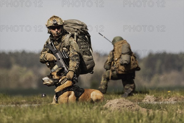 Soldiers of the German Armed Forces as well as a mission dog