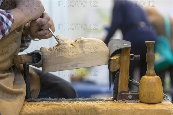 Maskenschnnitzer works on a wooden mask for a Swabian-Alemannic Fasnet figure