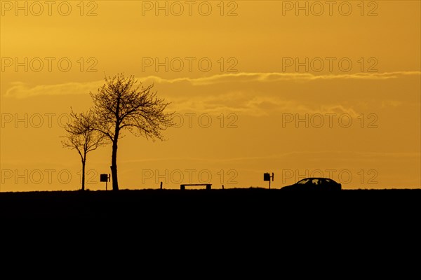 A car stands out in the dusk near Gebelzig