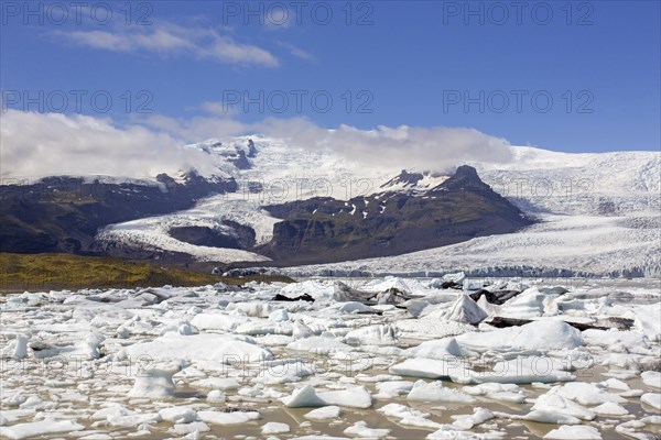 View over the glacier lake Fjallsarlon and Icelandic glacier Fjallsjoekull