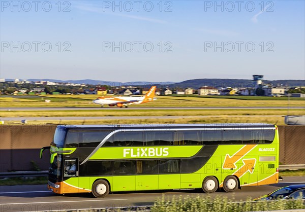 Flixbus on the road on the A8 motorway at the airport