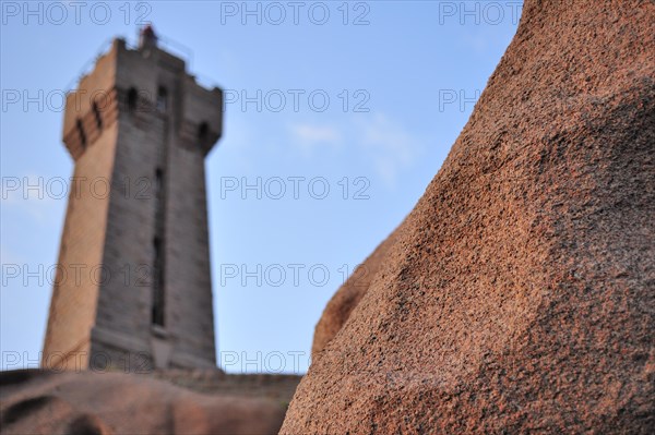 The Pors Kamor lighthouse at sunset along the Cote de granit rose