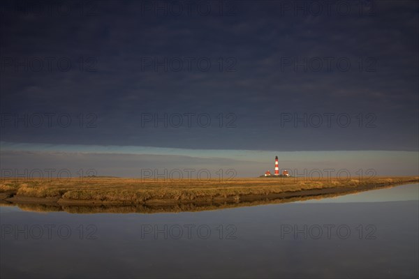 Lighthouse Westerheversand and salt marsh at Westerhever