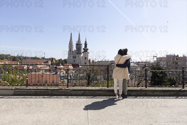 Two lovers look at the city of Zagreb