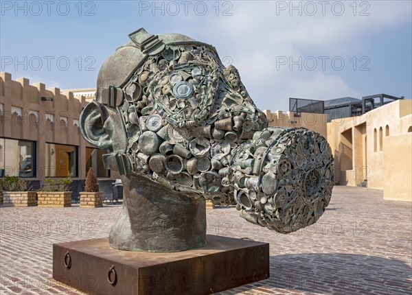 Head with gas mask statue