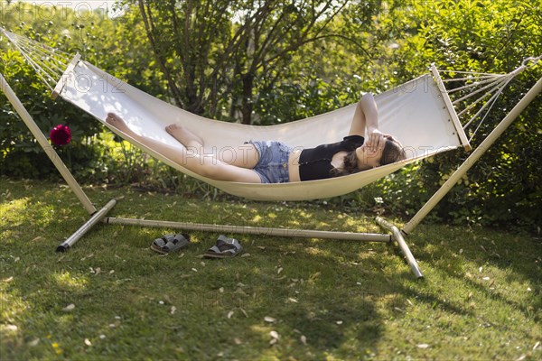 Young people in a hammock