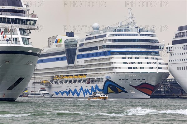 Cruise ships moored at the Stazione Marittima cruise terminal