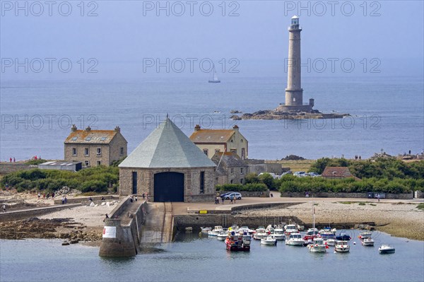 Phare de Goury lighthouse and lifeboat station in the port near Auderville at the Cap de La Hague