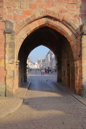 View through historic city gate from the Altpoertel onto Maximilianstrasse