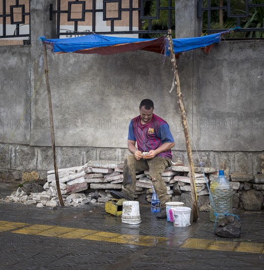 Man counting money in Addis Ababa