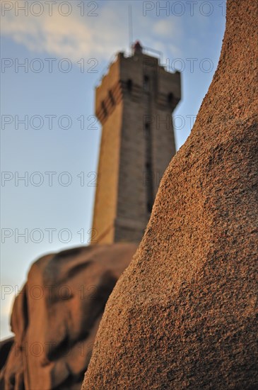 The Pors Kamor lighthouse at sunset along the Cote de granit rose