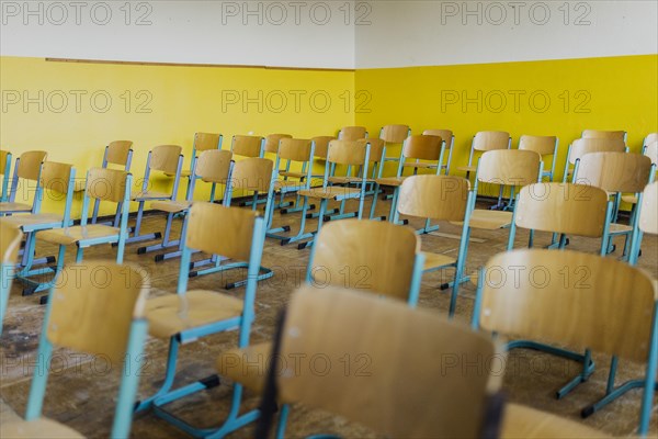 Chairs standing in a classroom of the old primary school in Trinwillershagen