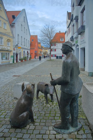 Sculptures at the Piggy Fountain with Pig Figure and Man