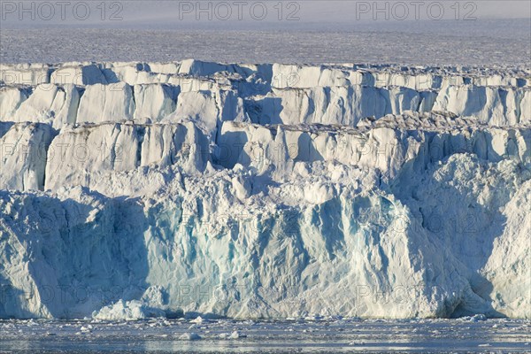 Lilliehoeoekbreen glacier calving into Lilliehoeoekfjorden