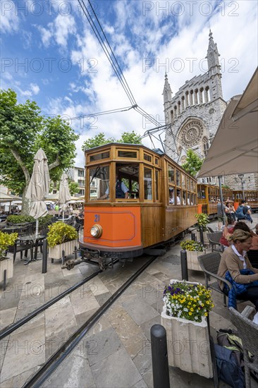 Historical tramway Tren de Soller and church Parroquia de Sant Bartomeu de Soller