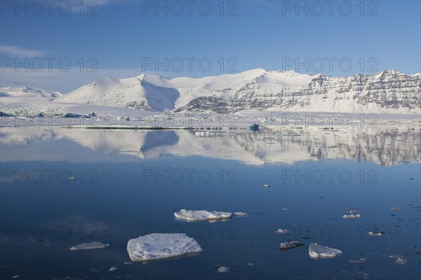 Drift ice floating in Joekulsarlon glacier lagoon in winter