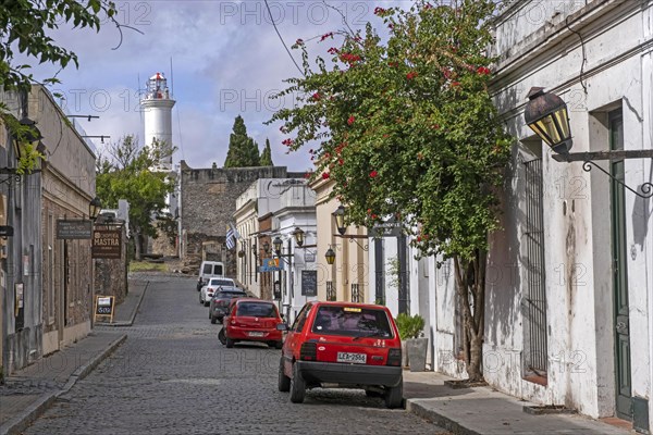 Cobbled street and lighthouse in the colonial Barrio Historico