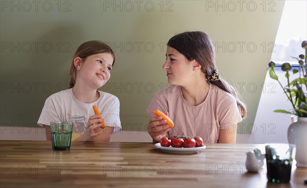 Children sitting at the dining table