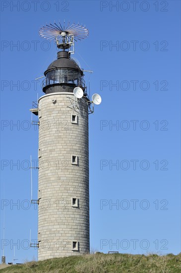 Lighthouse with antenna and satellite dishes at Cap Gris Nez