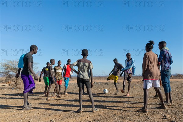 Group of young men playing football