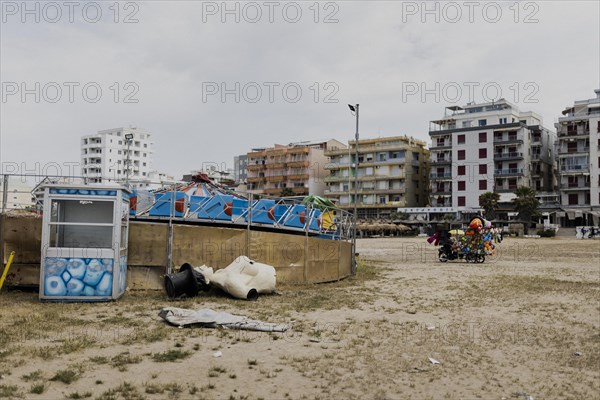 A bust lies on the beach of Durres