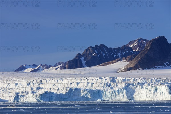 Lilliehoeoekbreen glacier calving into Lilliehoeoekfjorden