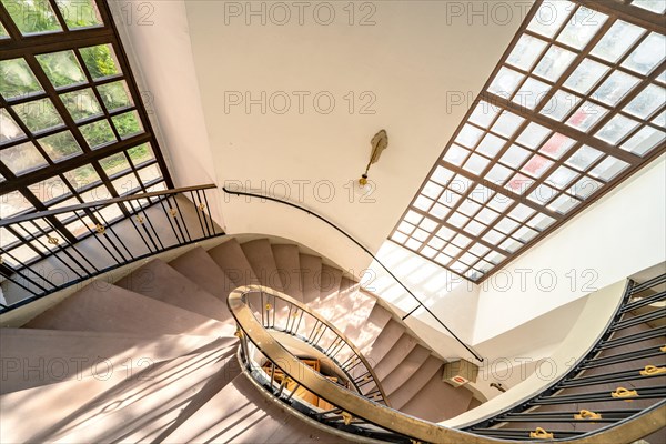 Spiral staircase in the sunlight