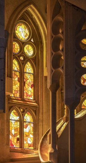 Spiral staircase and stained glass windows