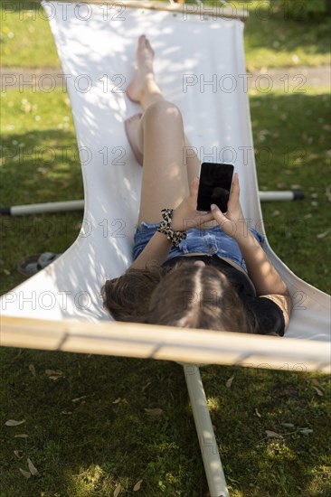 Young people in a hammock