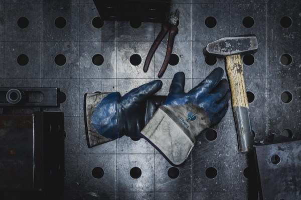 Work gloves lying on a worktop