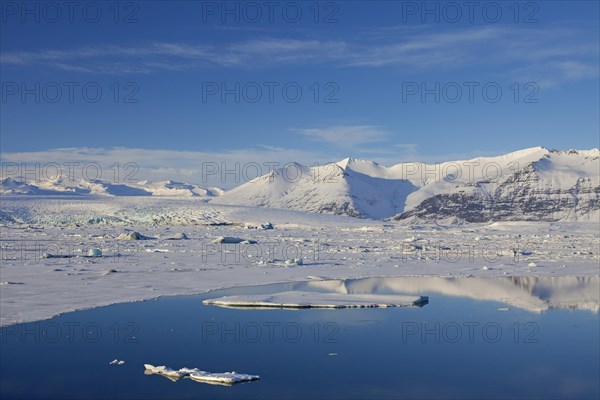 Drift ice floating in Joekulsarlon glacier lagoon in winter