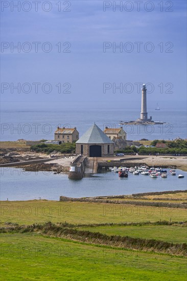 Phare de Goury lighthouse and lifeboat station in the port near Auderville at the Cap de La Hague