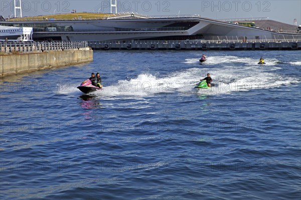 Water scooters on a canal Yokohama Port Kanagawa Japan Asia