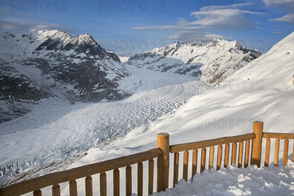 View over the mountains in winter surrounding the Swiss Aletsch Glacier