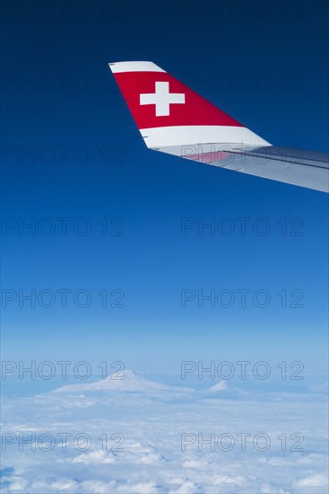 Flight over snowy mountain peaks