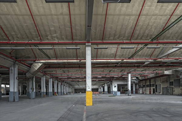 Empty production hall of a former paper factory