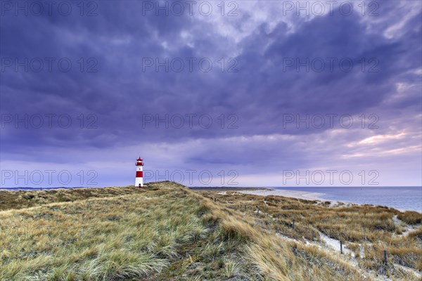 Red and white striped lighthouse List East