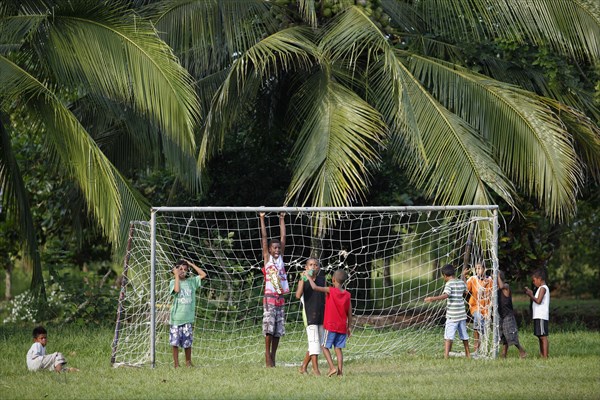 Costa Rican children playing football in Parismina