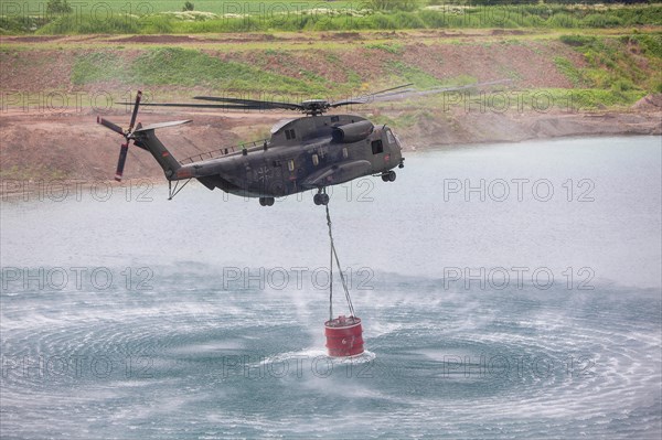 Bundeswehr helicopter with fire extinguishing tank 5000 litres