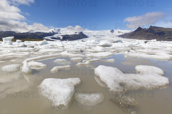 View over the glacier lake Fjallsarlon and Icelandic glacier Fjallsjoekull