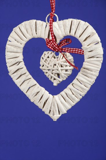 Two white hanging hearts