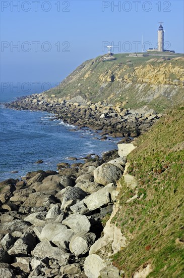 Lighthouse and sandstone boulders from cliff on beach at Cap Gris Nez