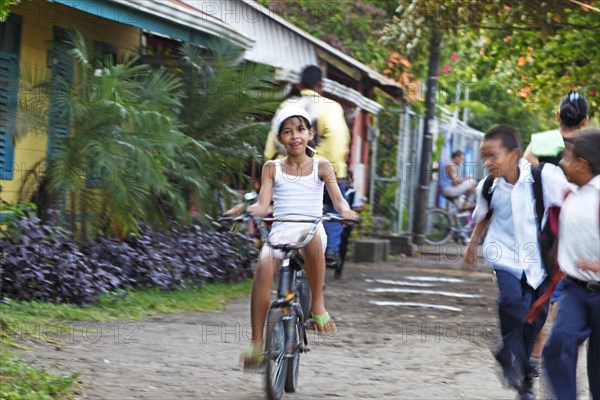 Costa Rican girl on a bicycle