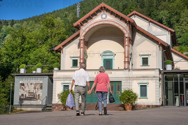 Retired couple in front of the spa theatre