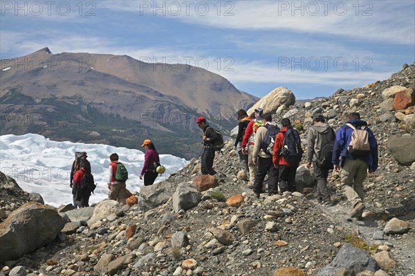 Tourists hiking to the Perito Moreno glacier in the Los Glaciares National Park