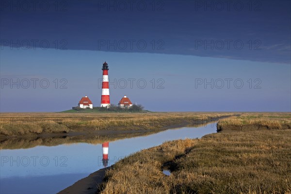 Lighthouse Westerheversand and salt marshes at Westerhever