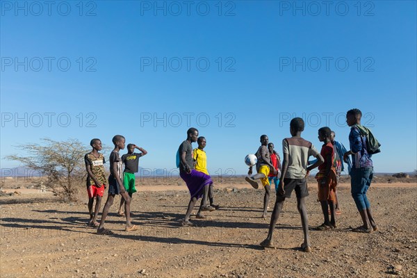 Group of young men playing football