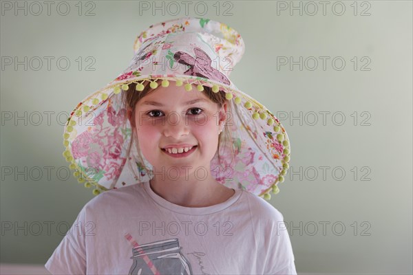 Girl with a lampshade on her head