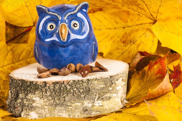 Owl figure on birch stump