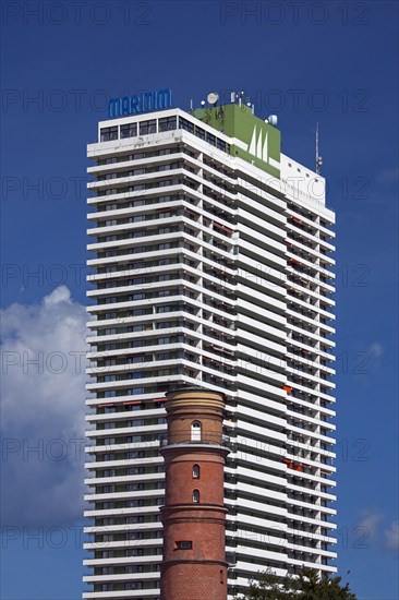 Maritim Hotel and the old lighthouse in the port of Travemuende